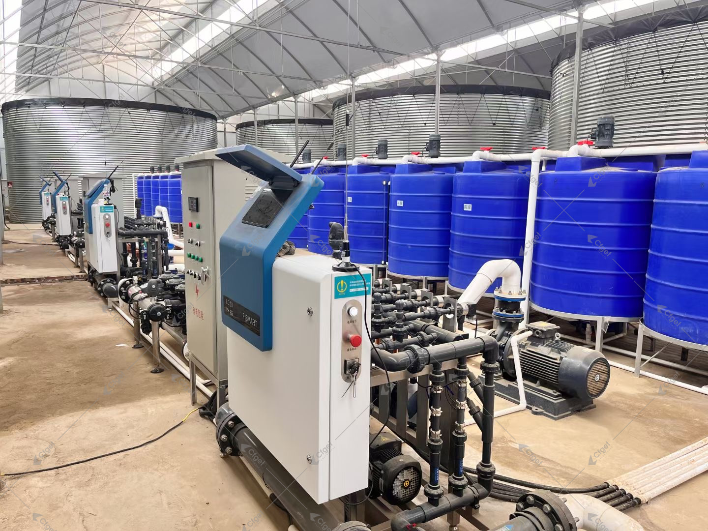 Greenhouse irrigation pump, dosing controls, valves, and storage tanks