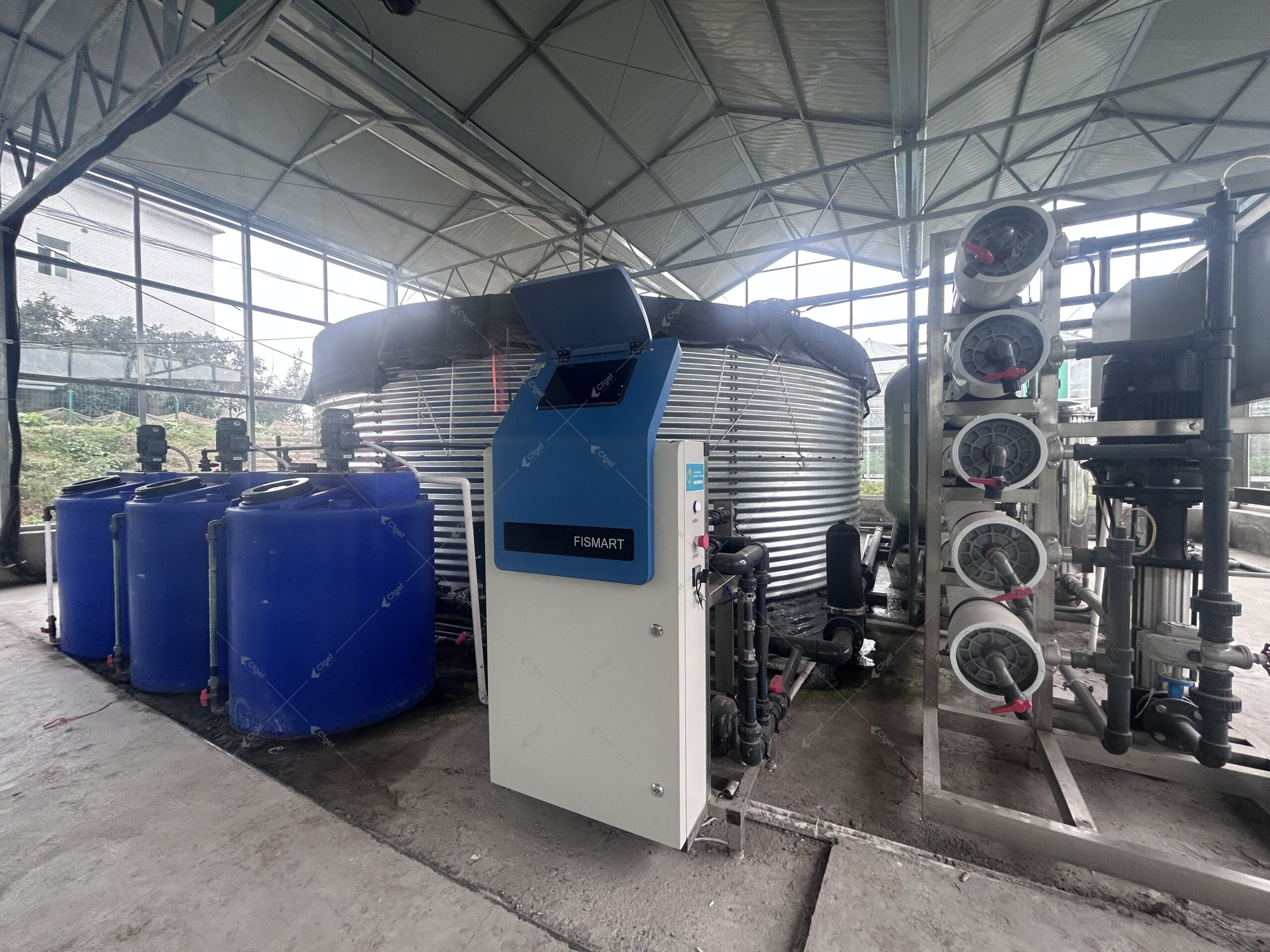 Greenhouse fertigation and water-treatment station with pumps and filter housings